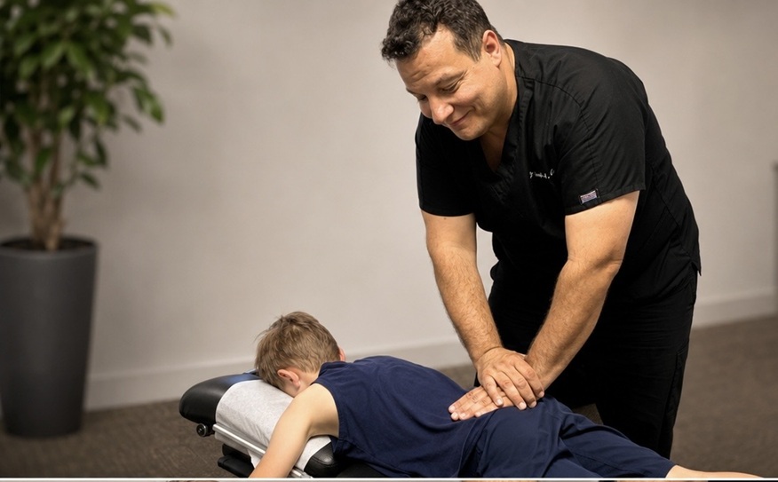 Chiropractor providing Multiple Sclerosis help with a gentle spinal adjustment in New York, NY