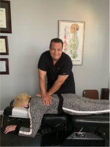 Chiropractor at Cucci Chiropractic performing an upper cervical adjustment to support nervous system function and emotional well-being